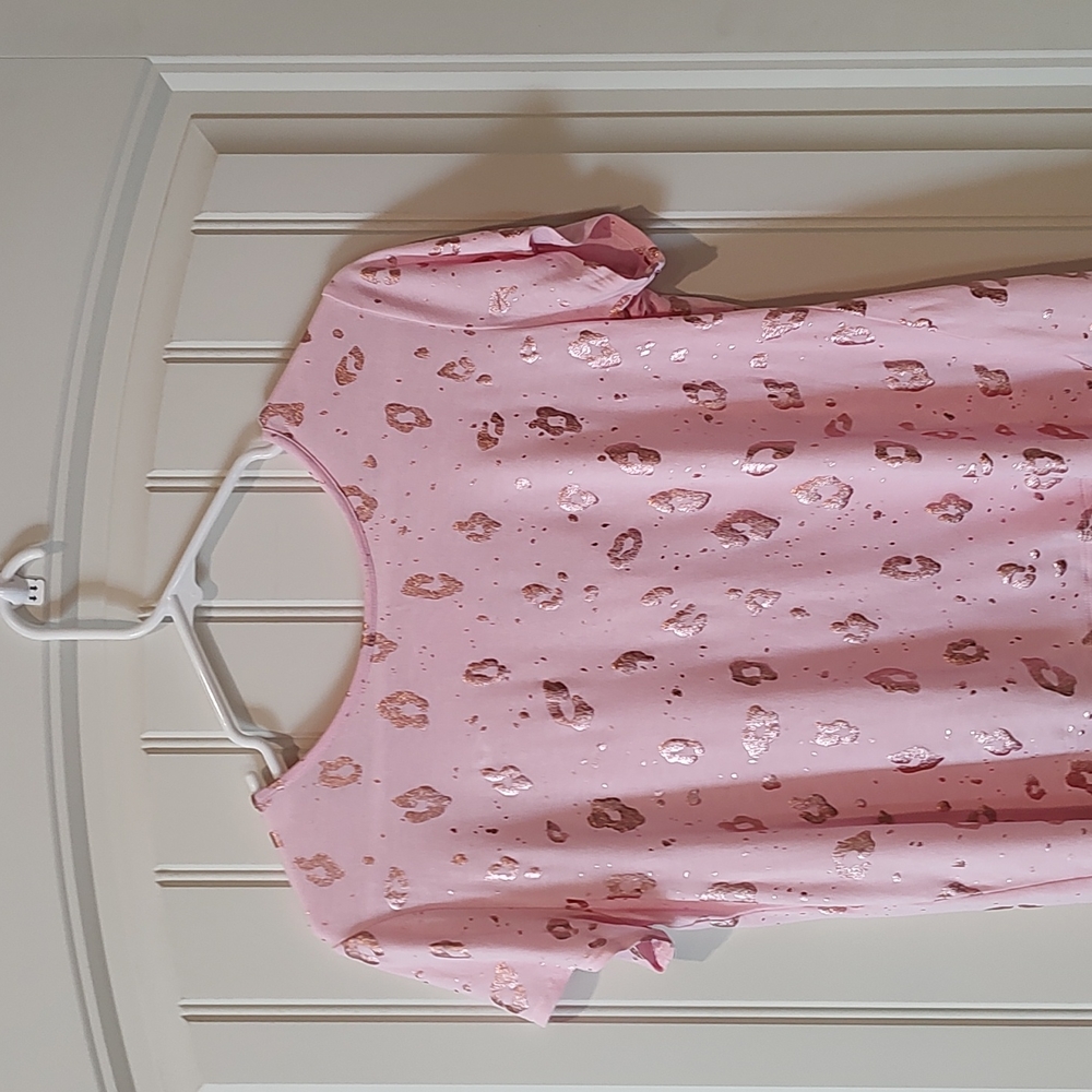 Never Worn, Pink, Justice Short Sleeve T-shirt with key hole upper back.